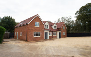 Two luxury new build houses on an old farmhouse site in Cheshunt